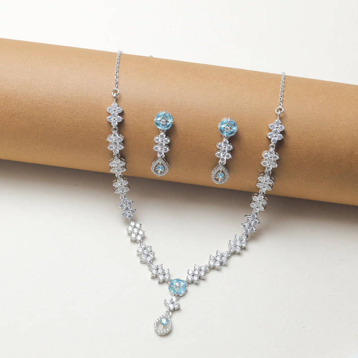 Tassya Blue Diamond Necklace Set – Elegant 925 silver set with shimmering blue stones, perfect for weddings and occasions.