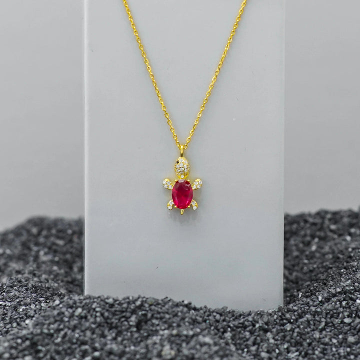 Tassya Ruby Turtle Pendant – Unique 925 silver chain with turtle charm and ruby red stone, perfect for luck and style.