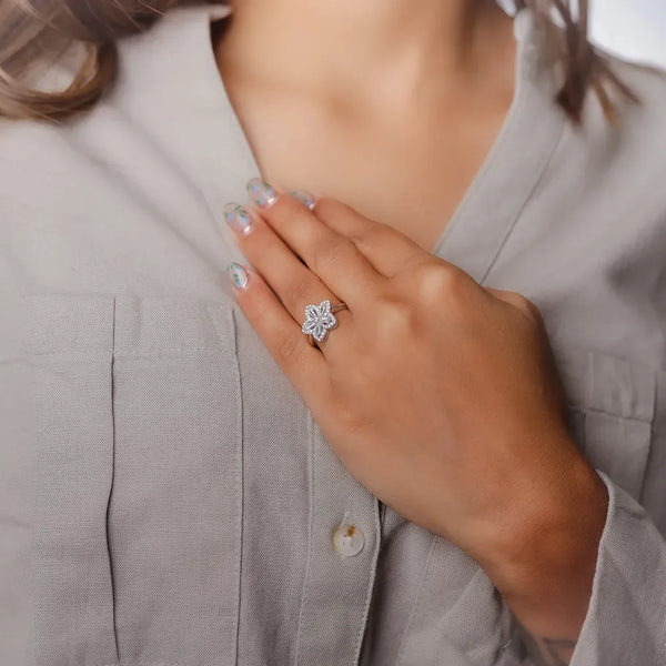 Blossom Silver Ring with marquise-cut stones on a hand, showcasing elegant 925 sterling silver craftsmanship.