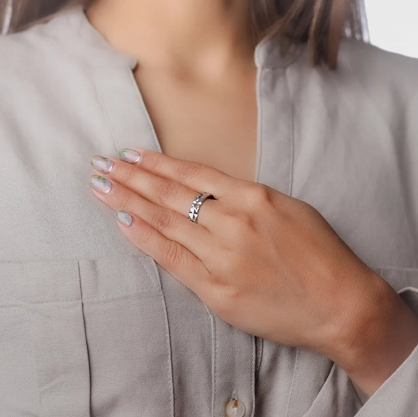 Tassya Classic Diamond-Cut Silver Band – Timeless 925 sterling silver ring with textured shine, ideal for everyday wear.