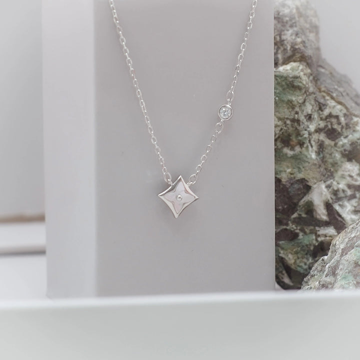 Tassya Silver Starlight Petal Pendant – 925 silver chain with sparkling petal charm, ideal for elegant daily wear