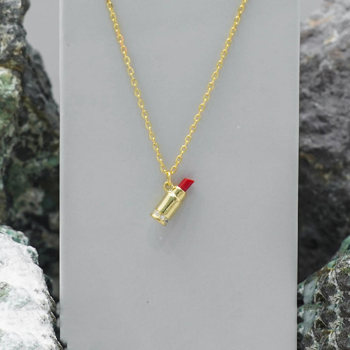 Tassya Golden Lipstick Pendant – Trendy 925 silver chain with gold-toned lipstick charm, perfect for bold, chic styling.