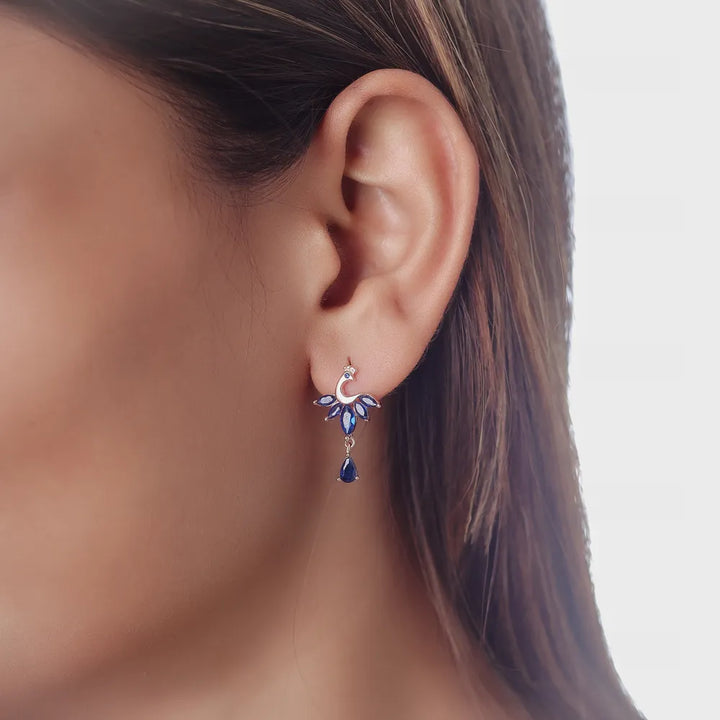 Tassya Sapphire Peacock Earrings – Stunning 925 silver earrings with peacock design and blue stones, perfect for festive elegance.