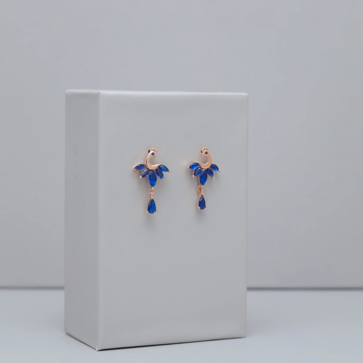 Tassya Sapphire Peacock Earrings – Stunning 925 silver earrings with peacock design and blue stones, perfect for festive elegance.