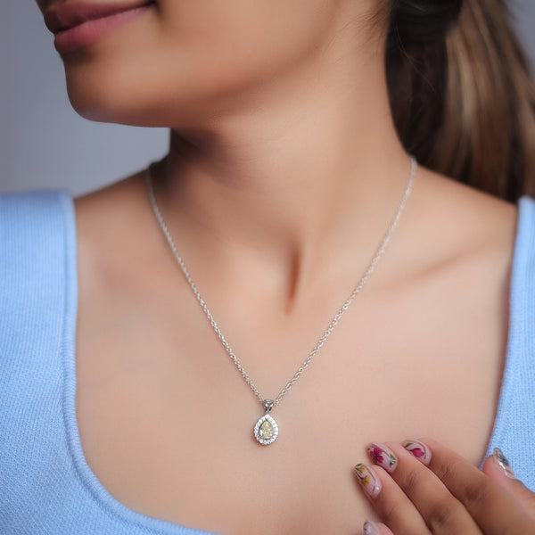 Sterling silver chain pendant with yellow teardrop stone by Tassya Silver.